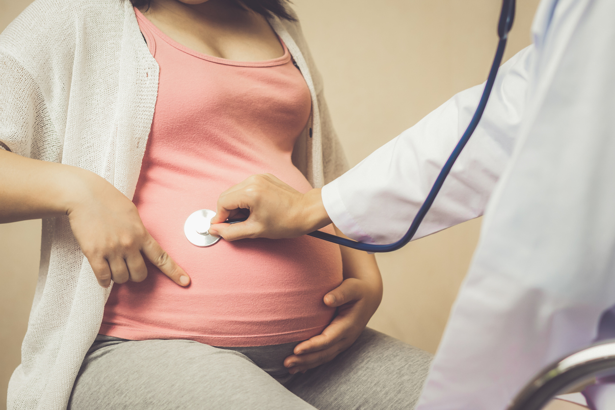 Pregnant Woman and Gynecologist Doctor at Hospital