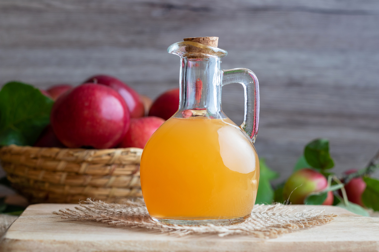 A bottle of raw unfiltered apple cider vinegar