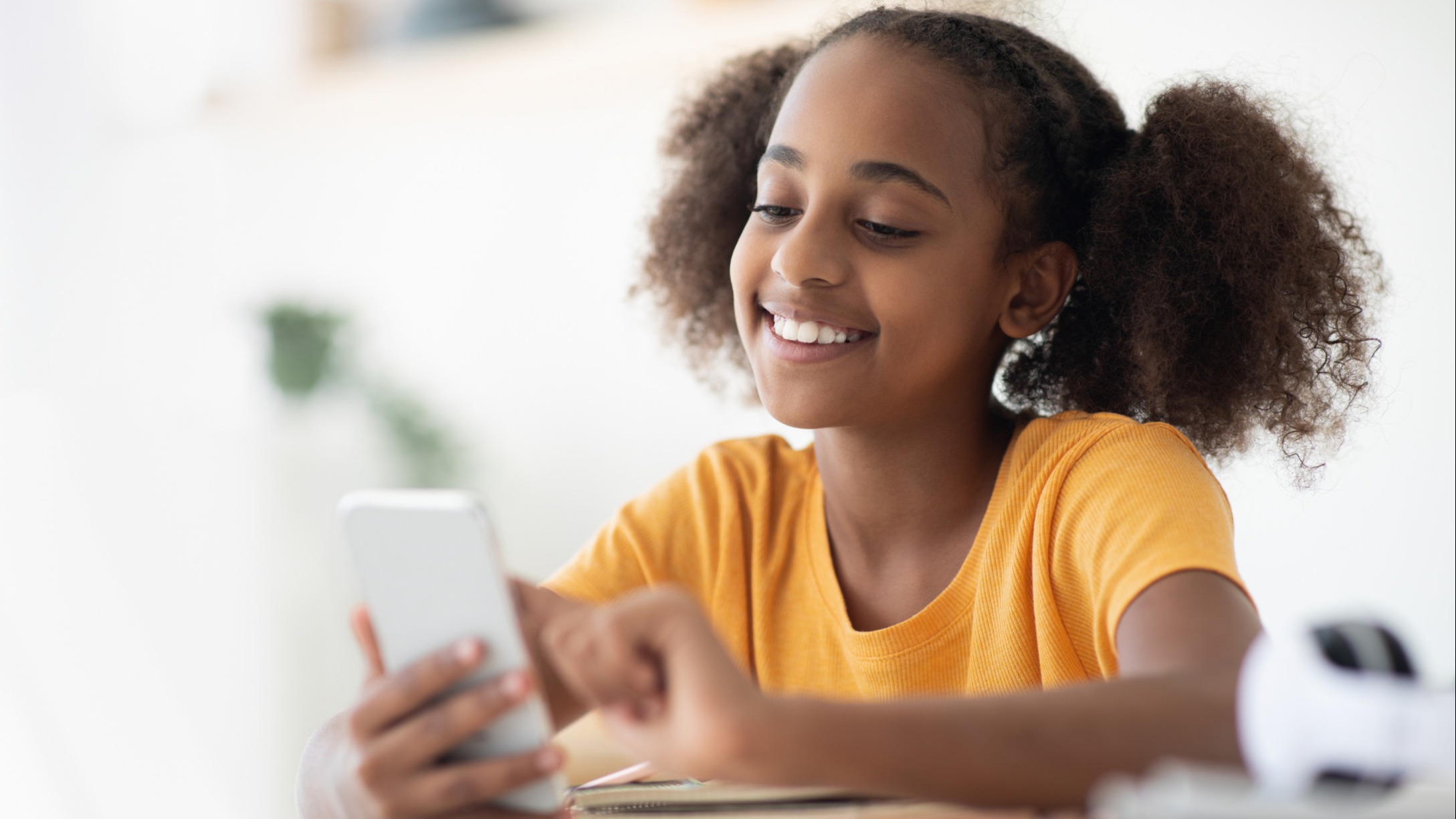 Girl using phone for educational science apps