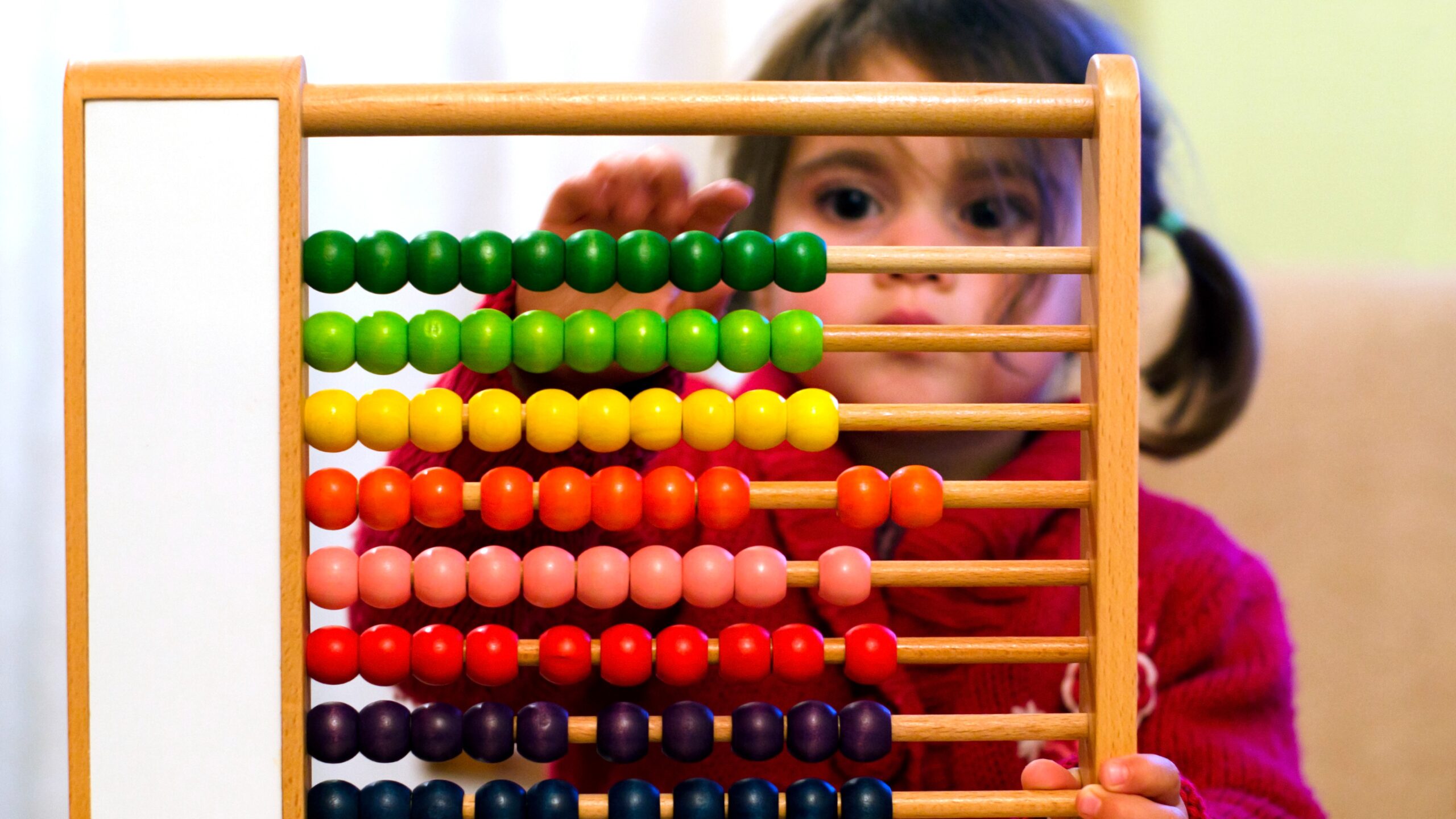 Child using abacus