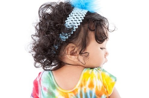 toddler in tie dye