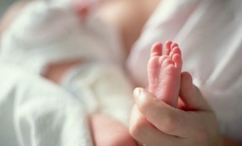 woman holding baby