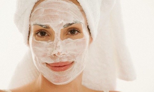 Woman with beauty face mask