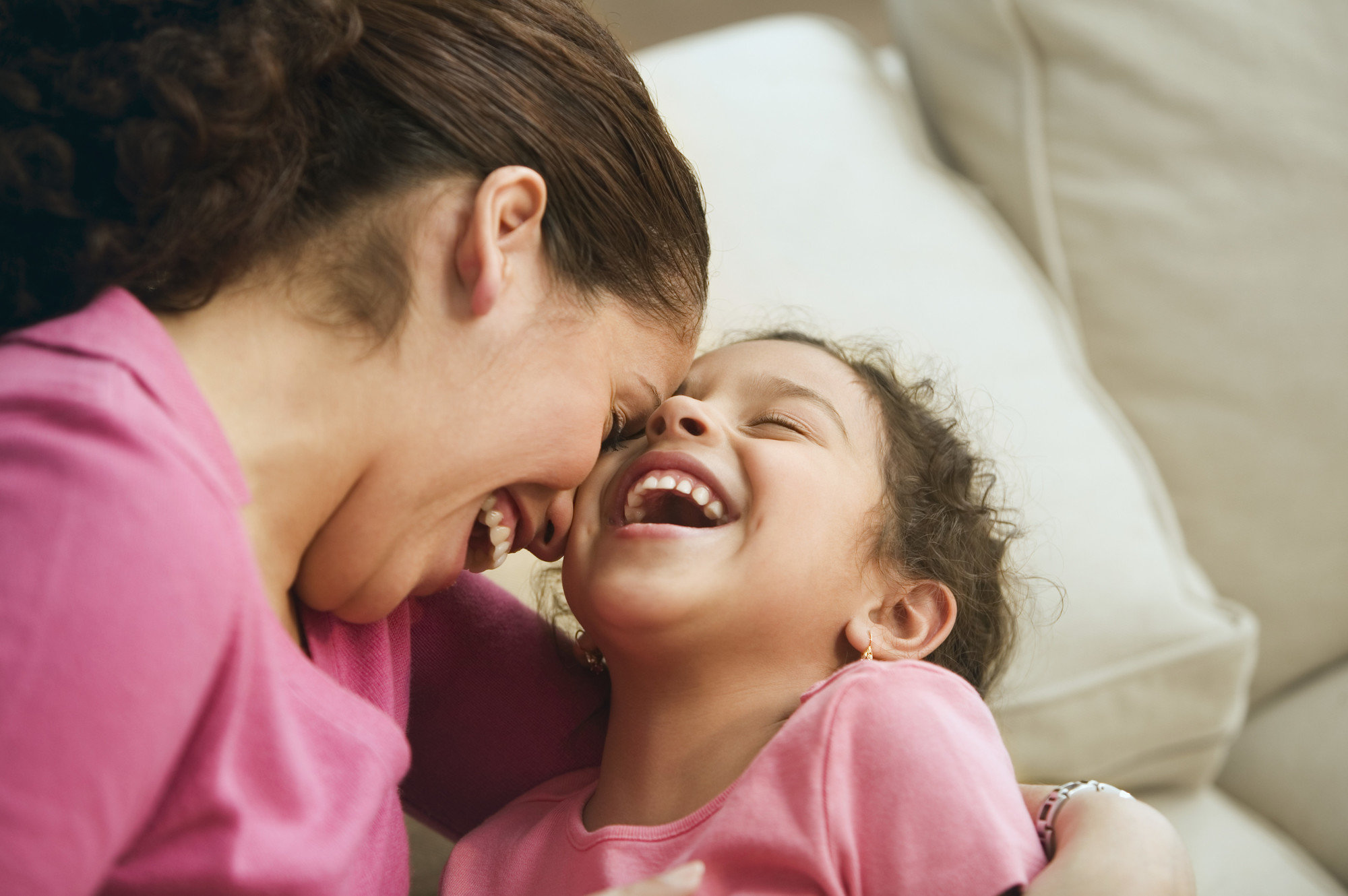 mom laughing with child