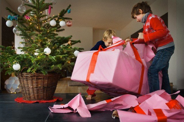 boys opening christimas gifts