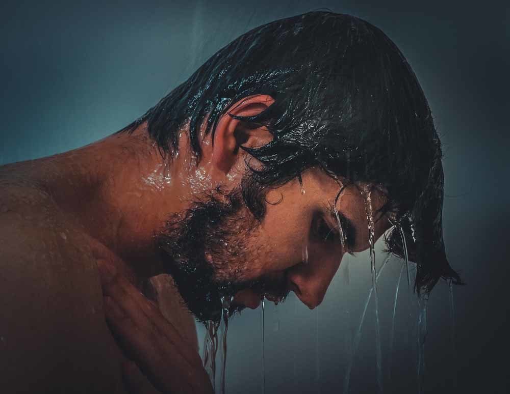 man in shower