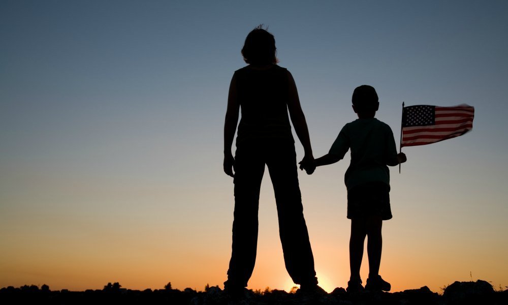 mom and kid American flag