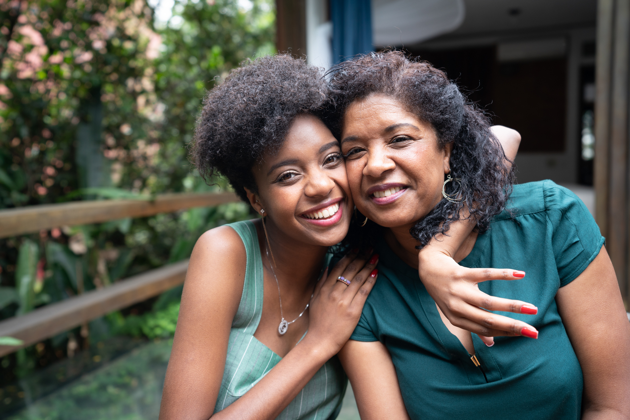 Mother and Daughter Embracing at Home