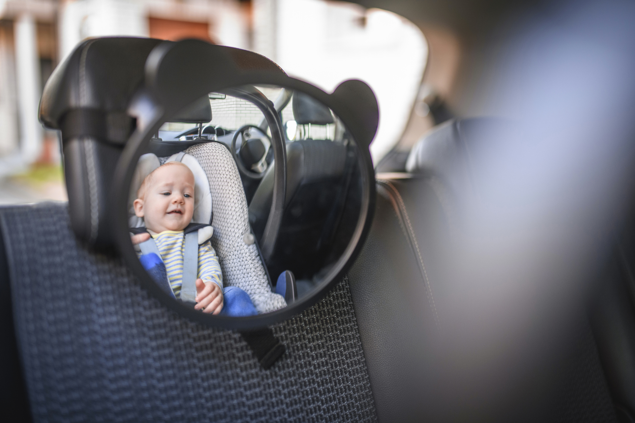 Baby boy in a car safety seat