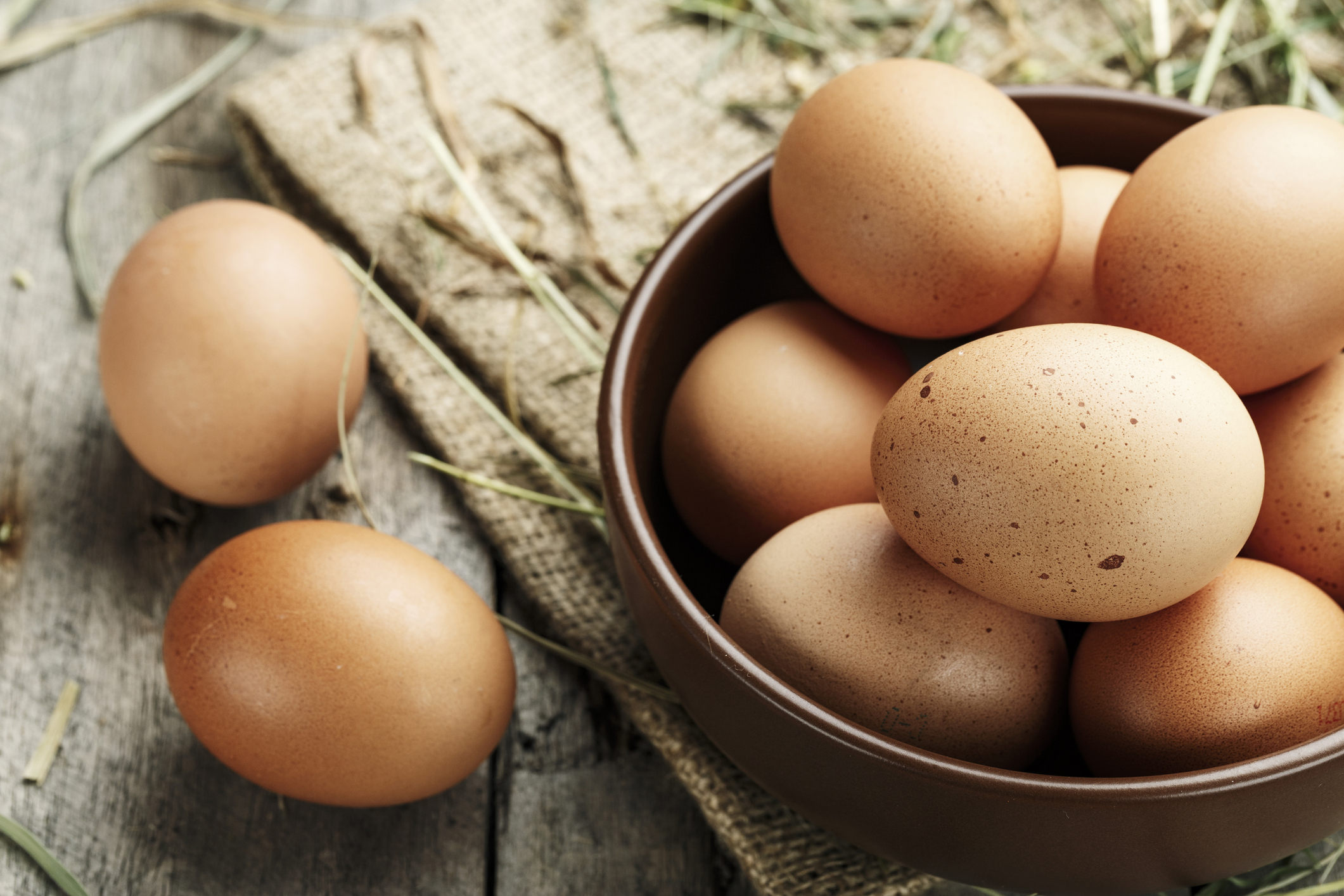 Brown eggs in a plate.