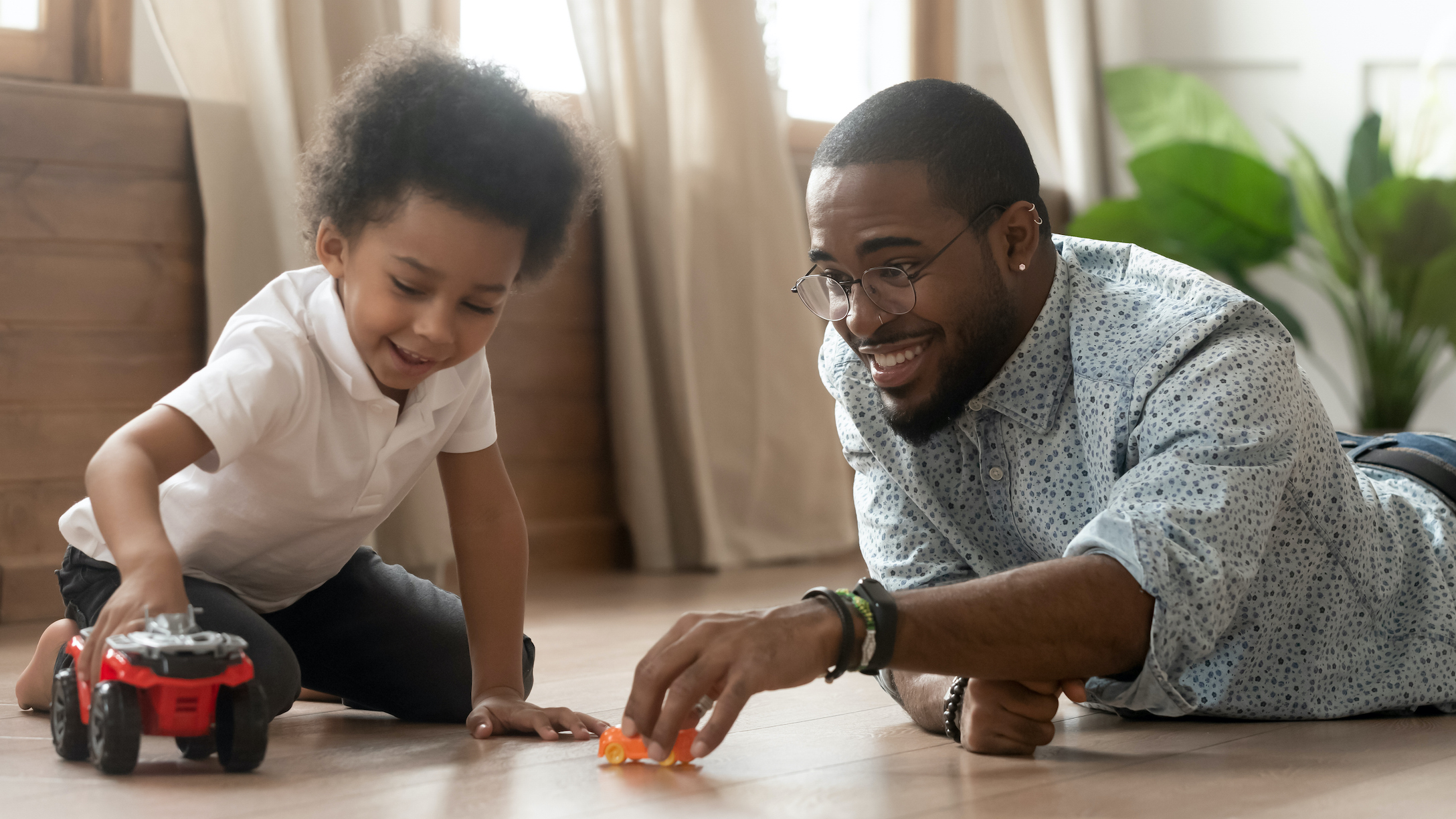 father playing with son