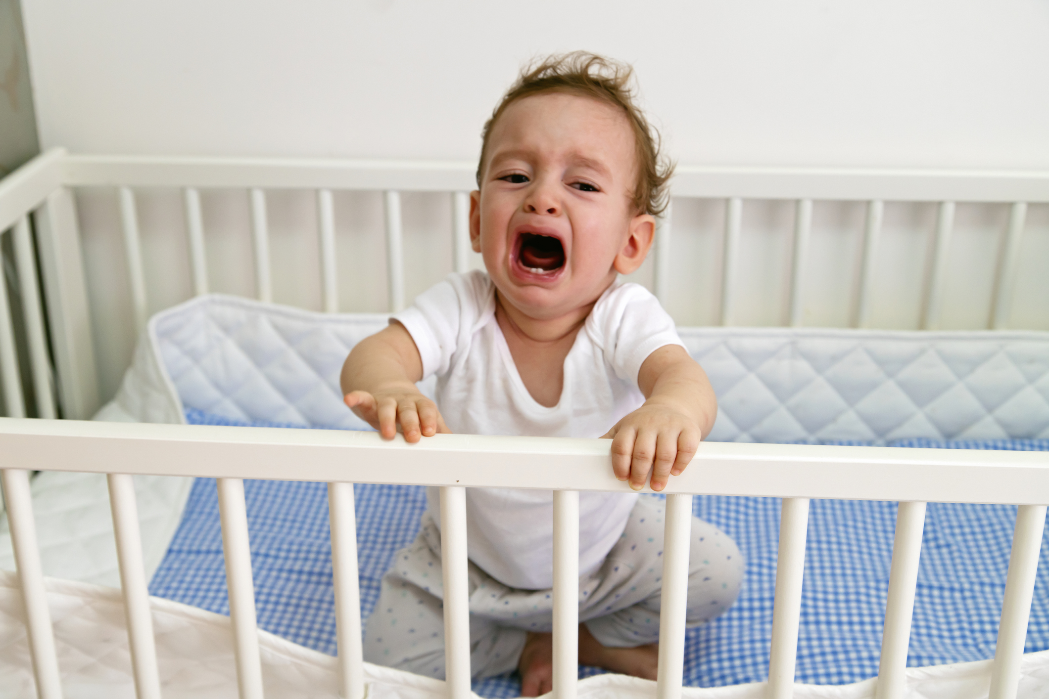 Baby Boy Crying in Crib