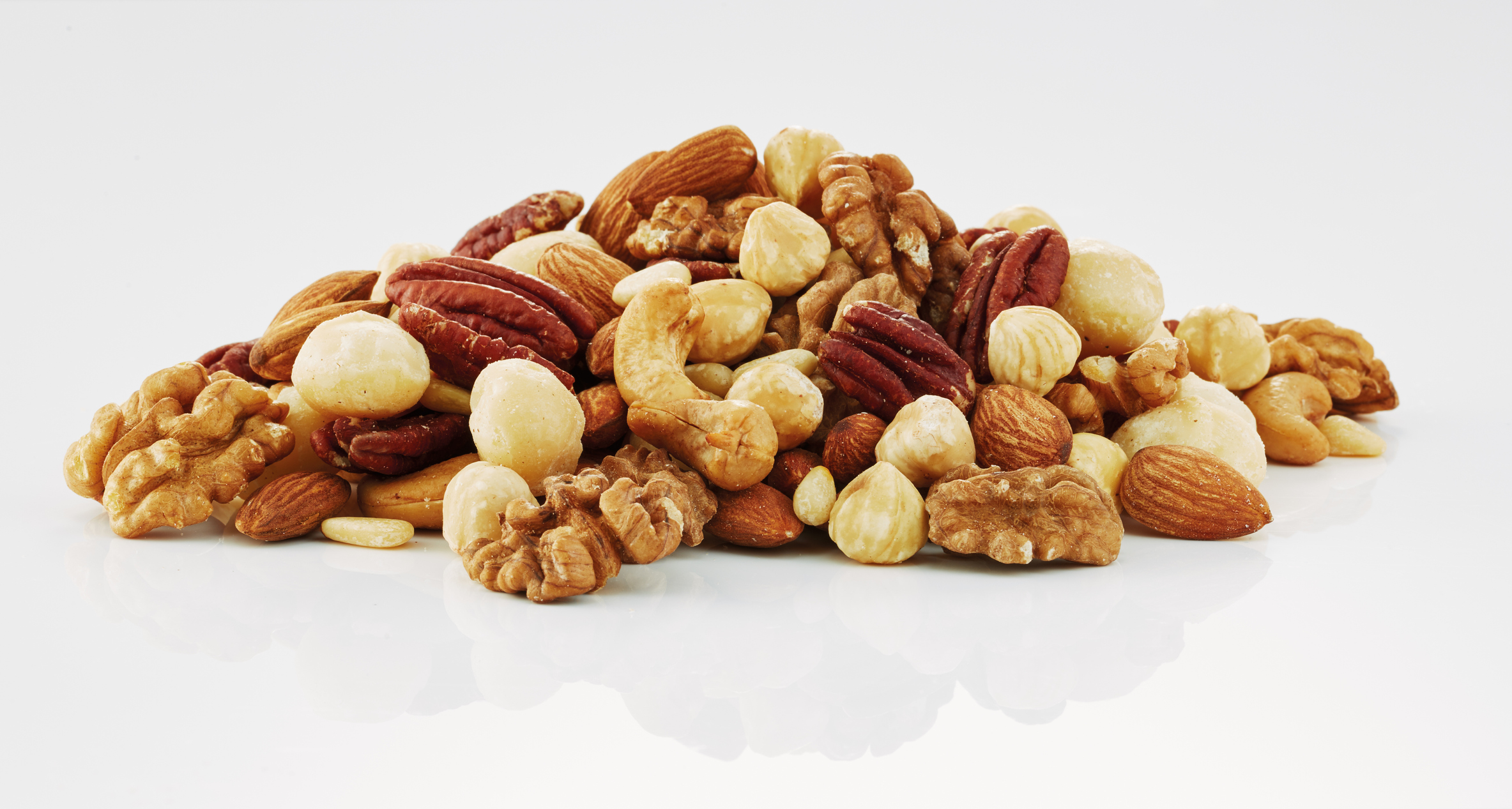 mixing nuts isolated in white background