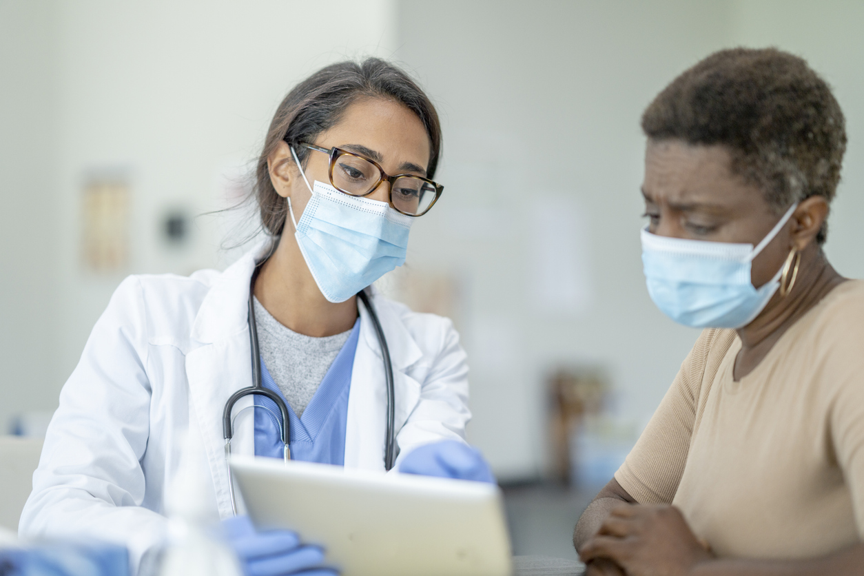 Doctor and patient in medical exam