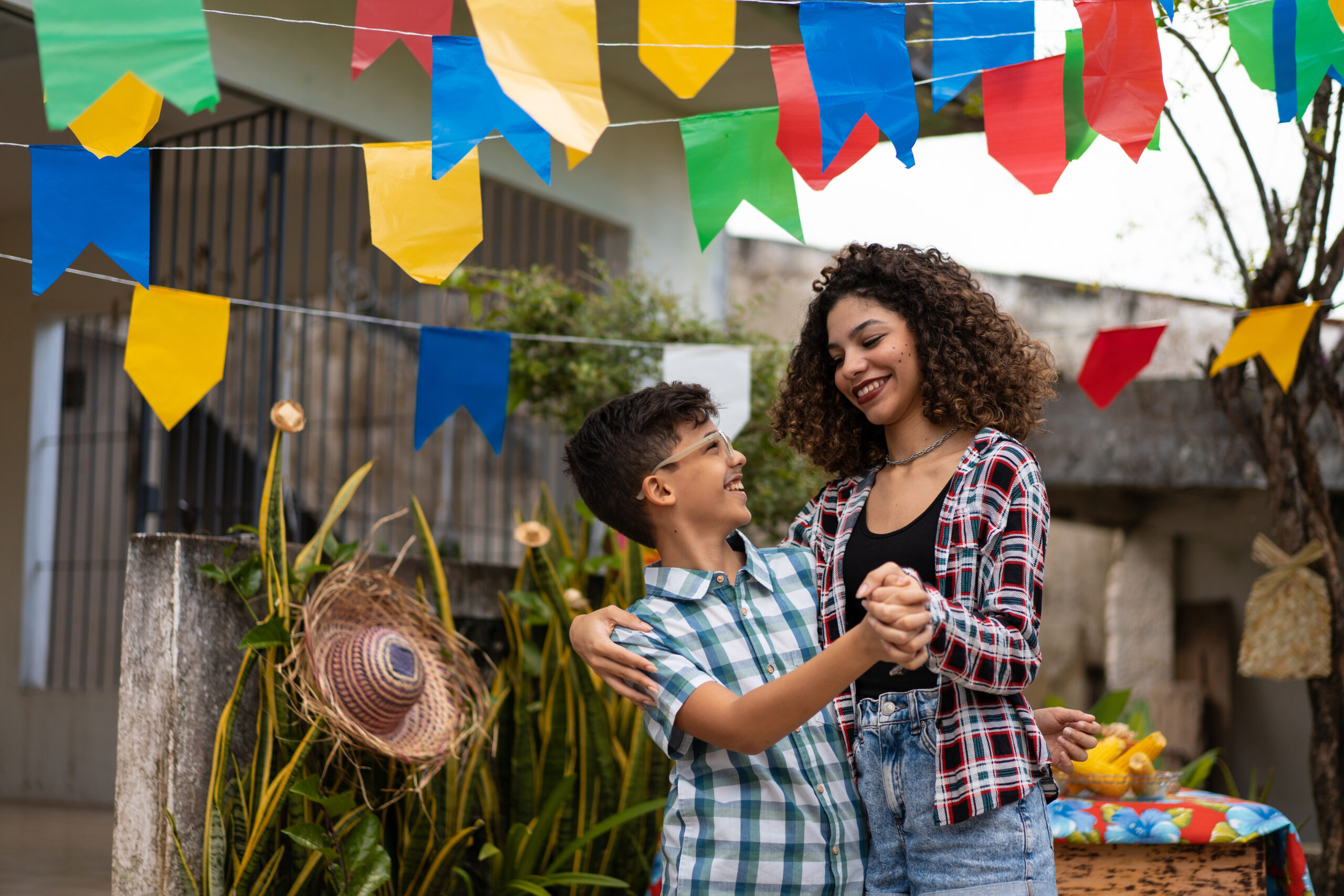 Siblings dancing at Festa Junina