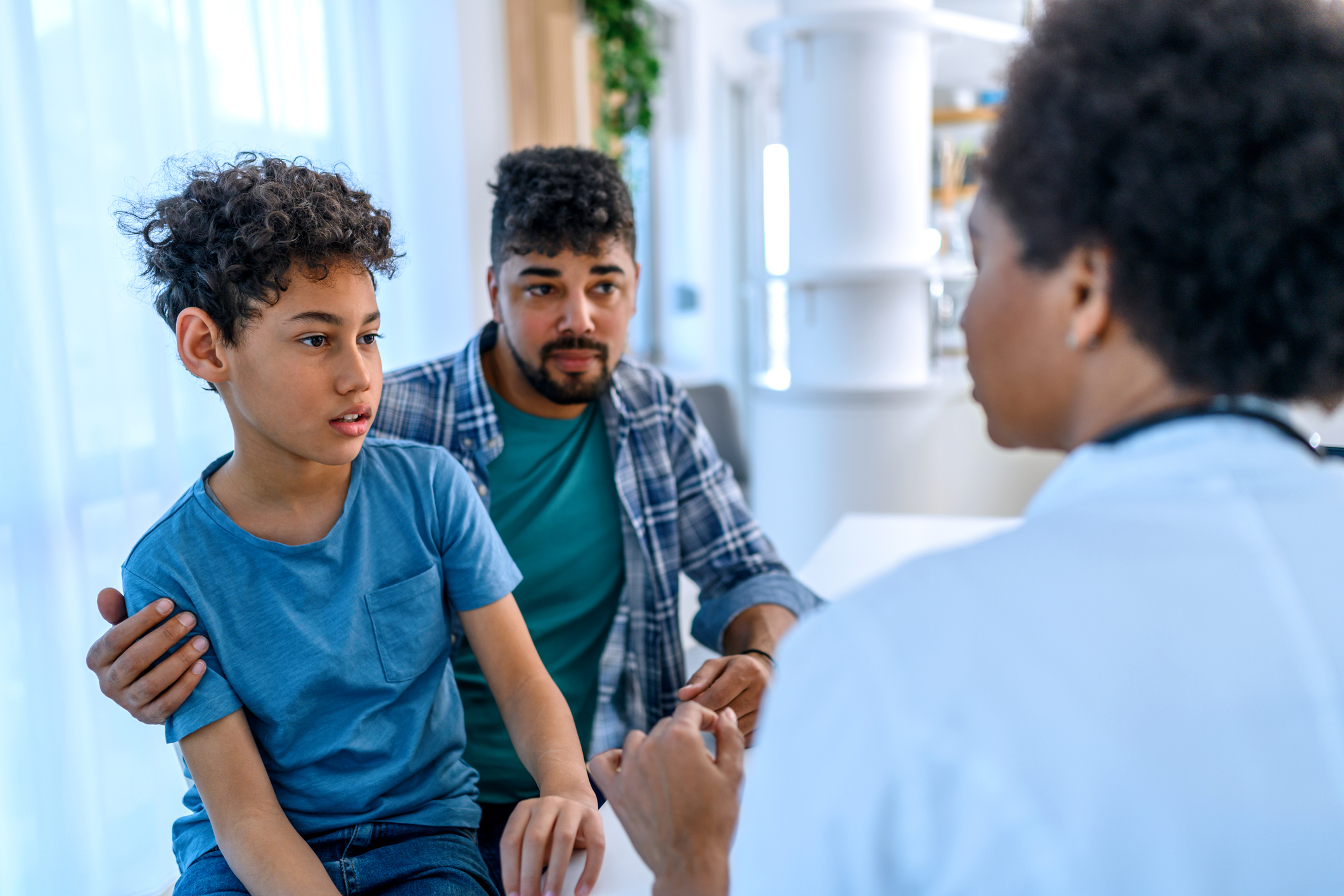 Black boy having a medical exam at doctor's office