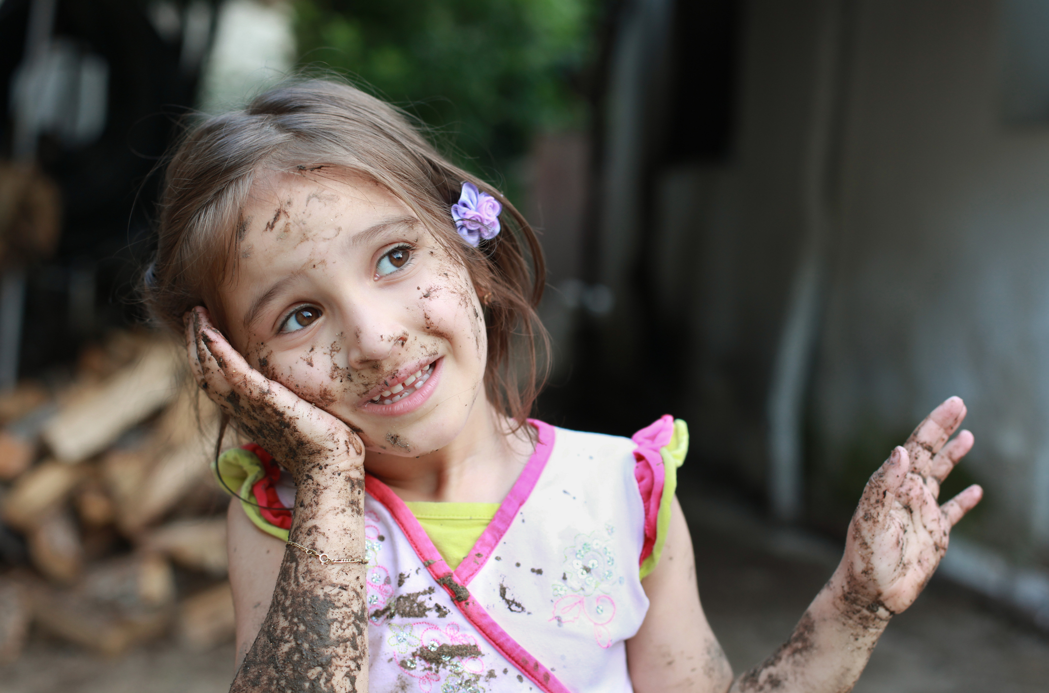 Mud girl wondering