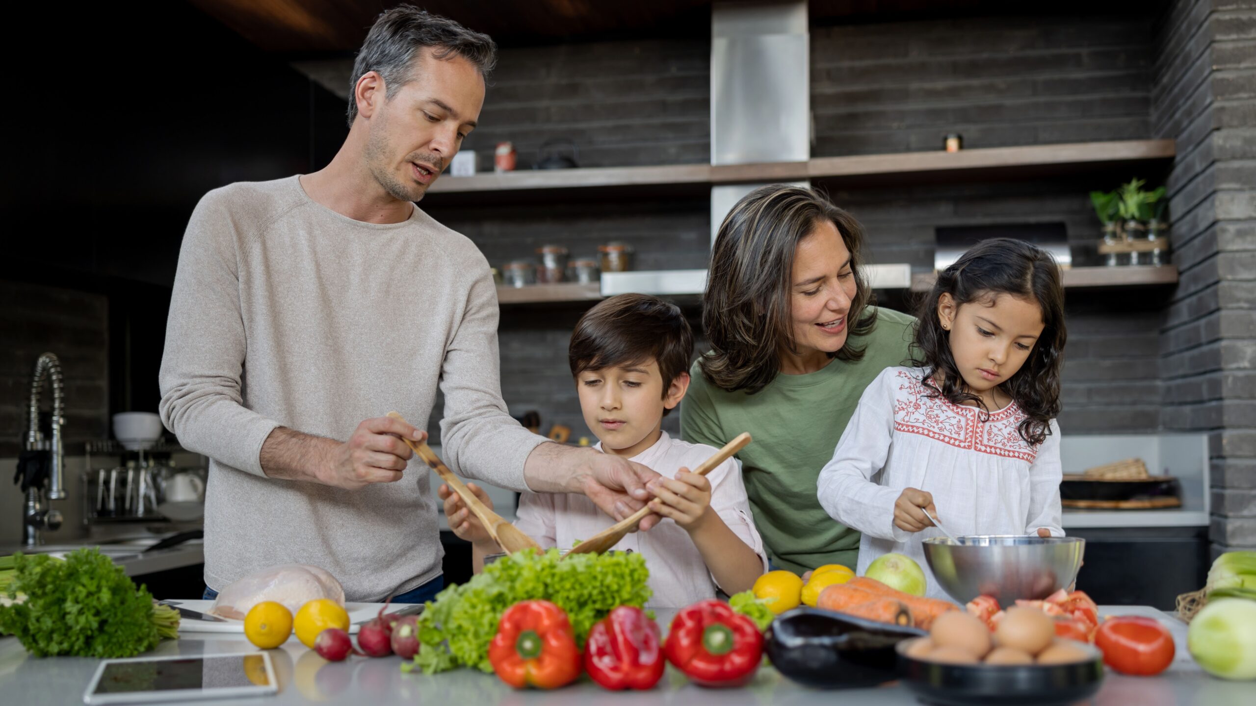 latin family cooking together