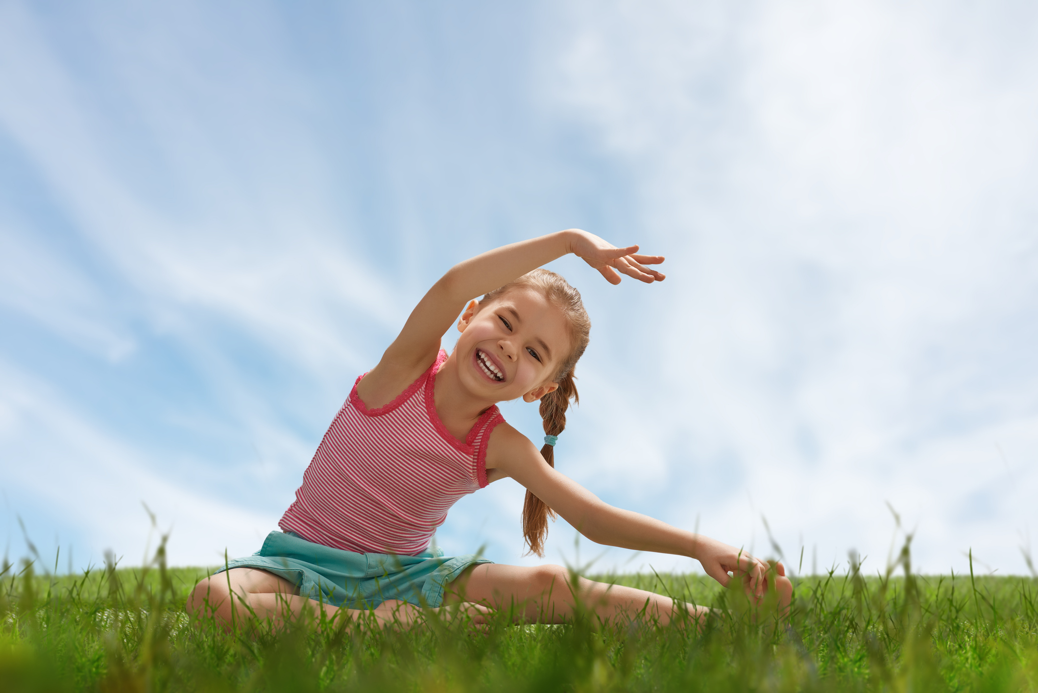 child practicing yoga