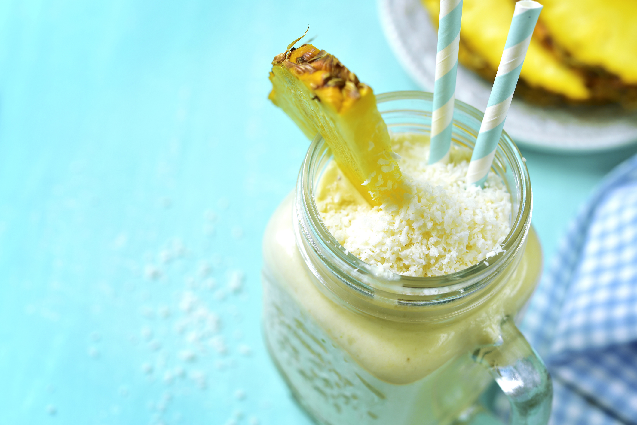 Tropical diet smoothie in a mason jar.