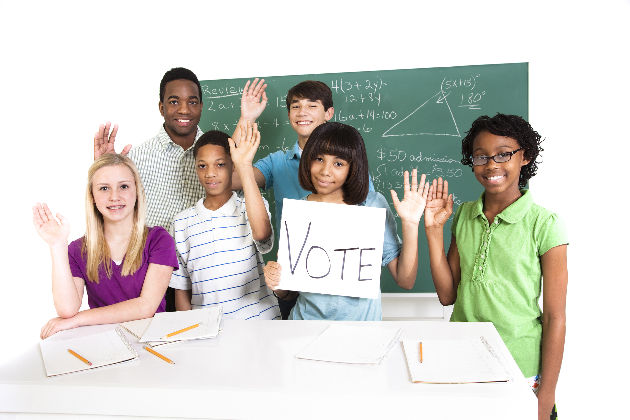 Education: Multi-ethnic, teenage math students and teacher. Vote. School, classroom.