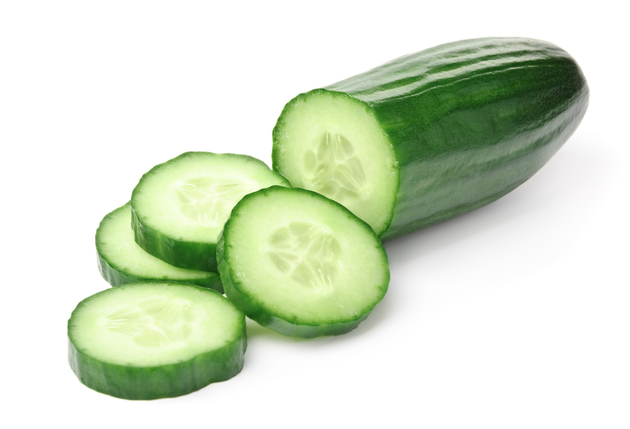 Cucumber slices on a white background