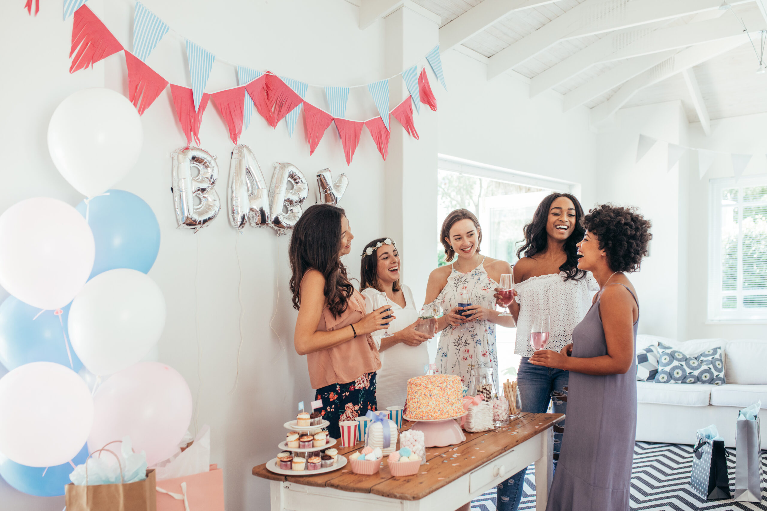 Diverse women together at baby shower