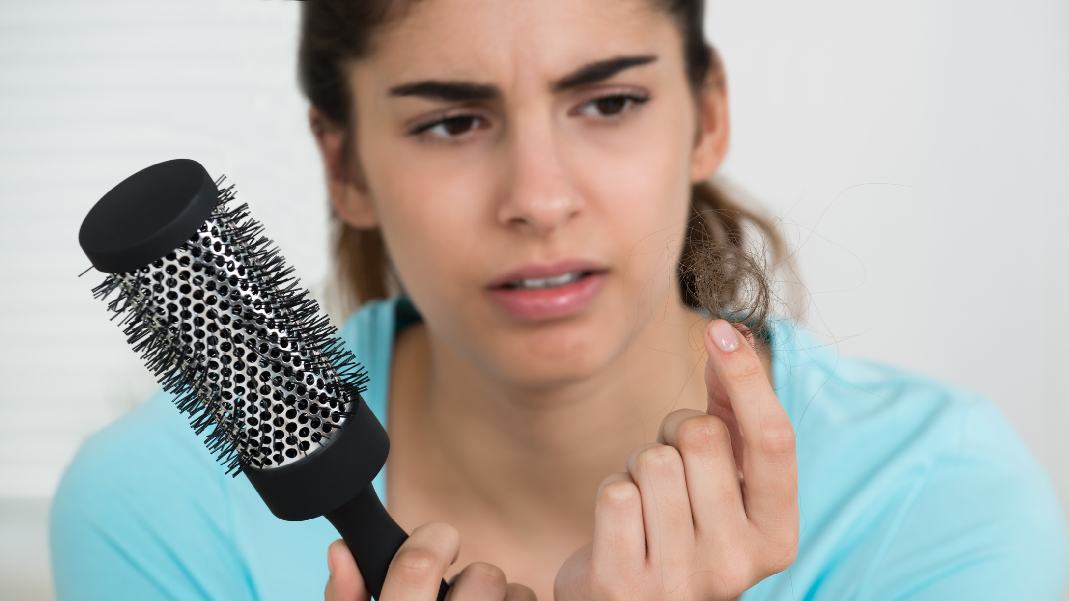 mujer caida del cabello