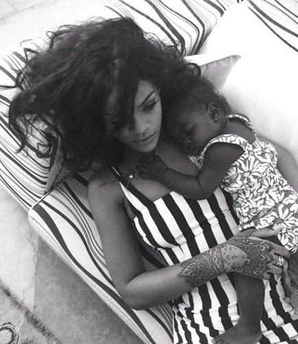 Rihanna with her niece. Could be pregnant.