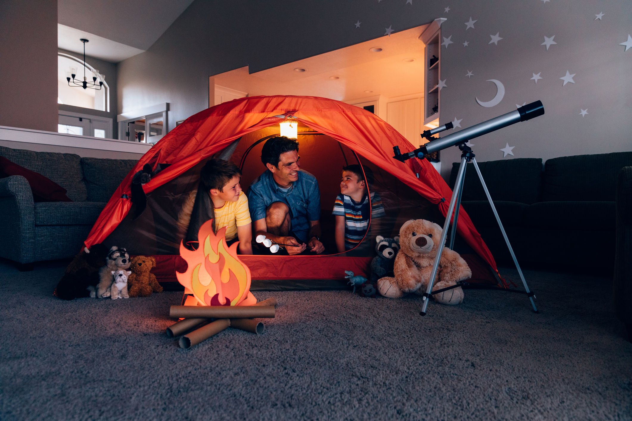 Father and Sons Camping Indoors