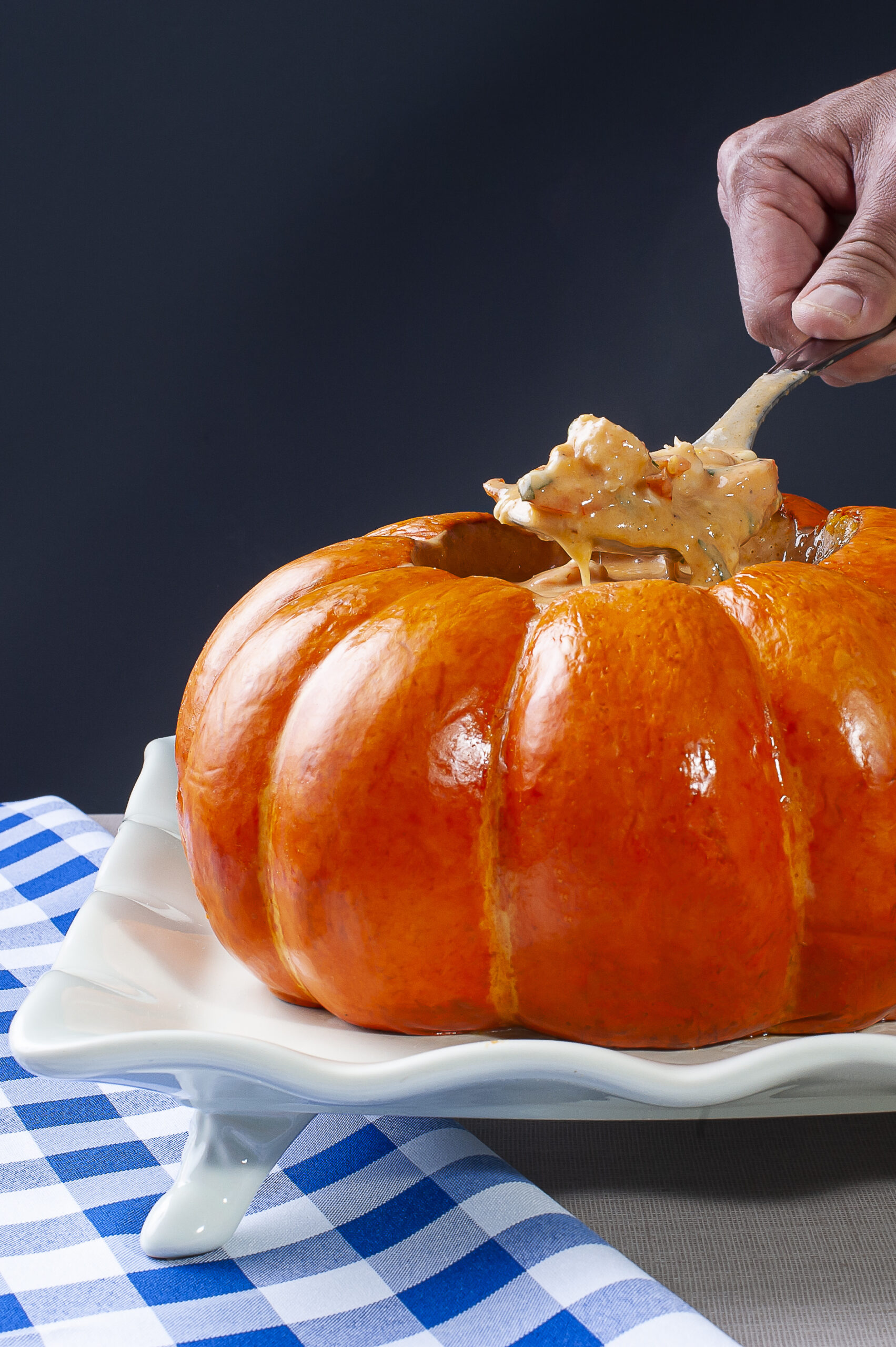 Shrimp in the pumpkin. Typical Brazilian dish, where the shrimp is made inside the pumpkin, with tomato sauce, cheese, creamy cheese and coconut milk.