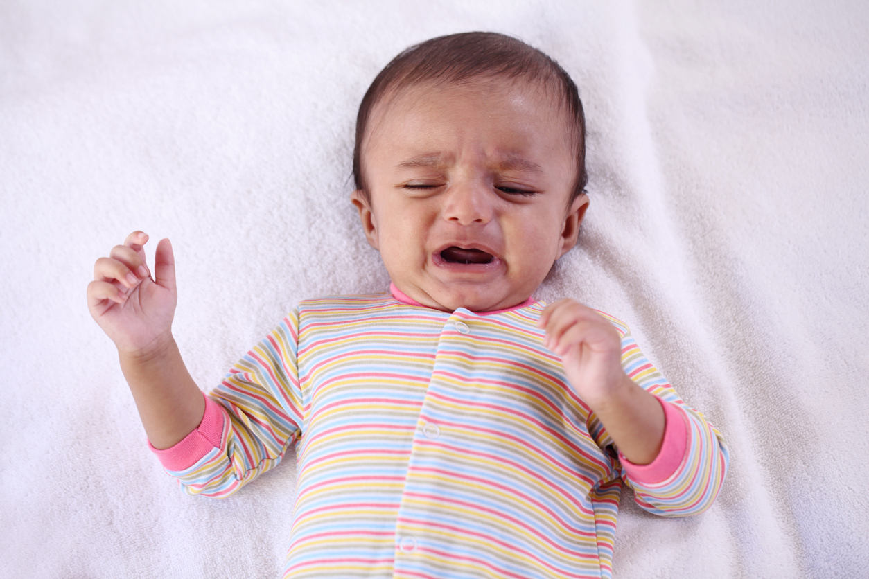 Newborn baby boy crying