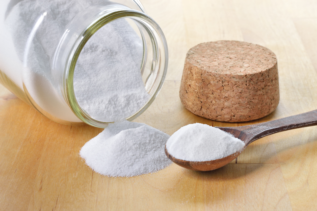 Close-up of baking soda in a glass jar.