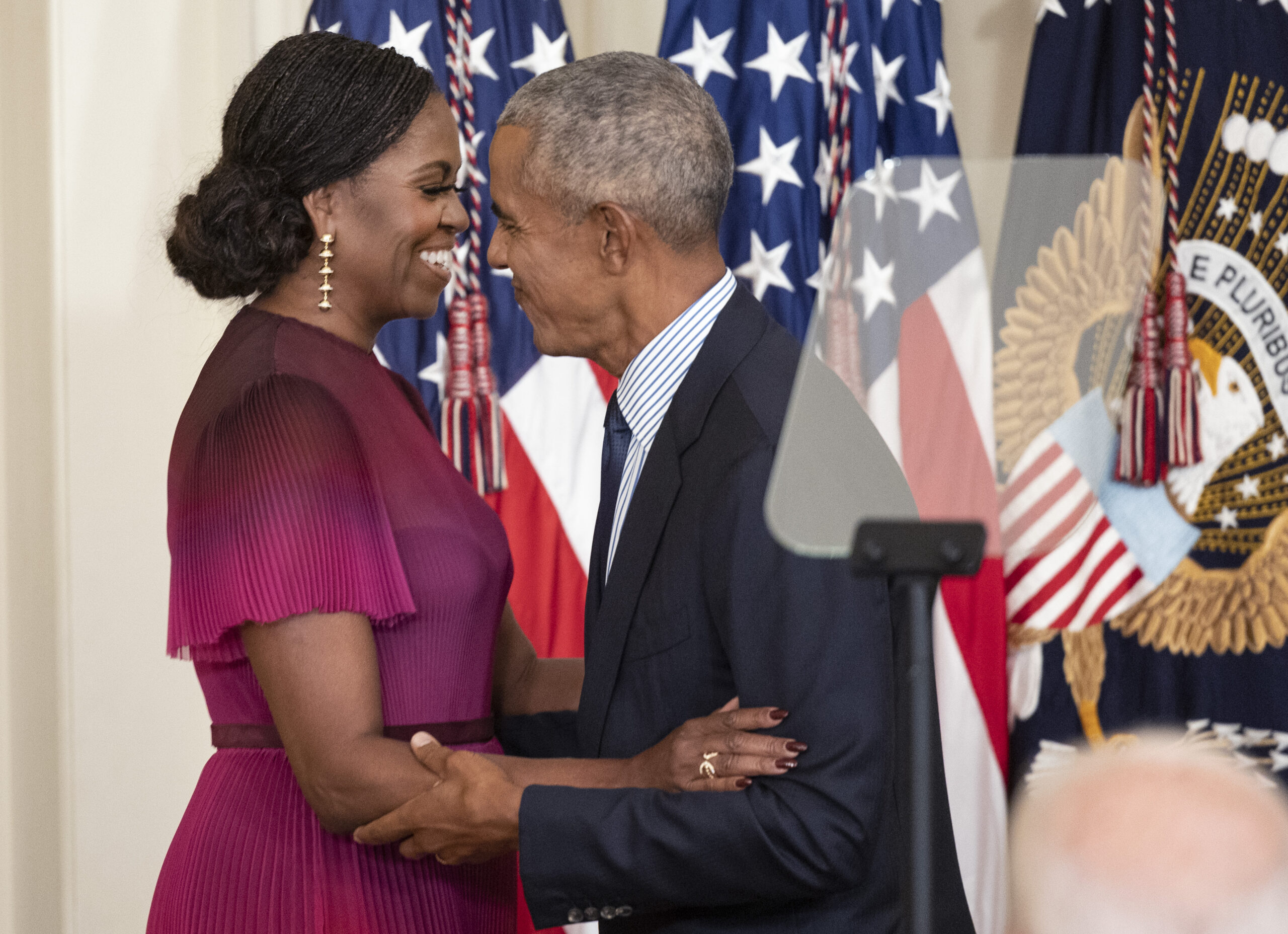 Barack And Michelle Obama Return To White House For Official Portrait Unveiling