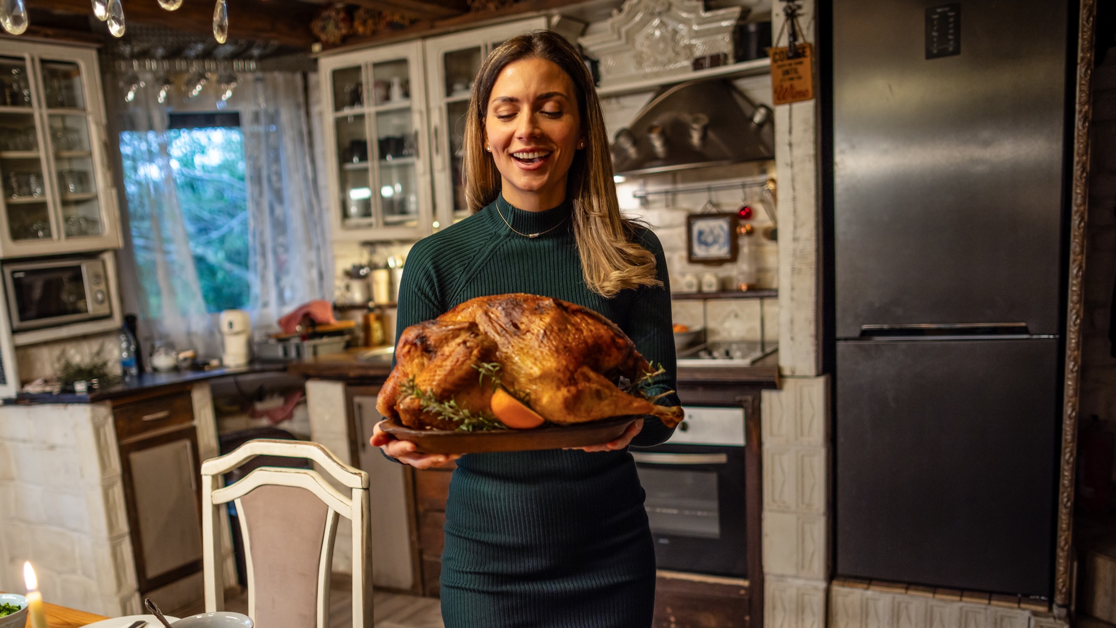 Woman serving Thanksgiving turkey