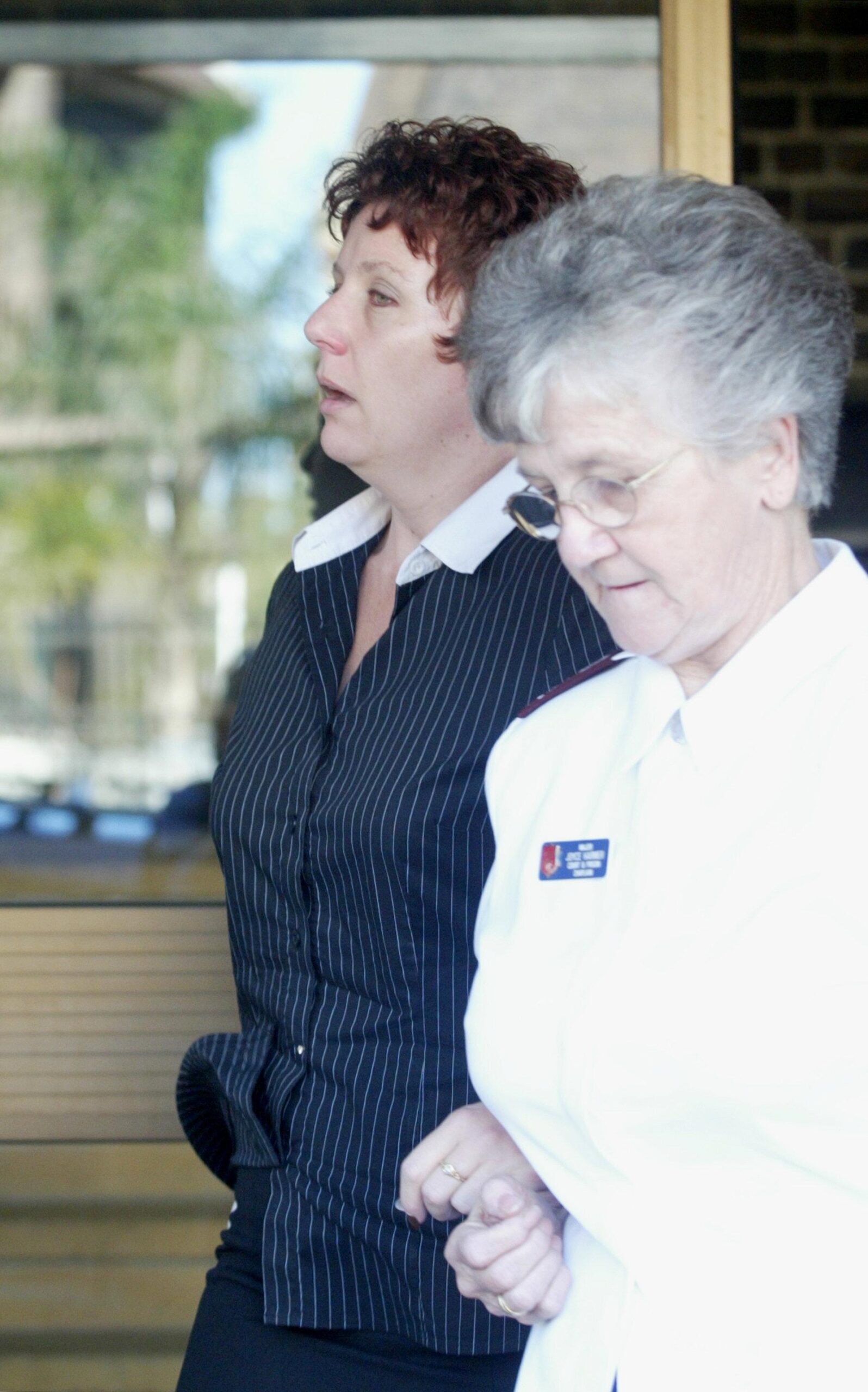 Kathleen Folbigg leaves Darlinghurst Court after breaking down with Joyce Harmer