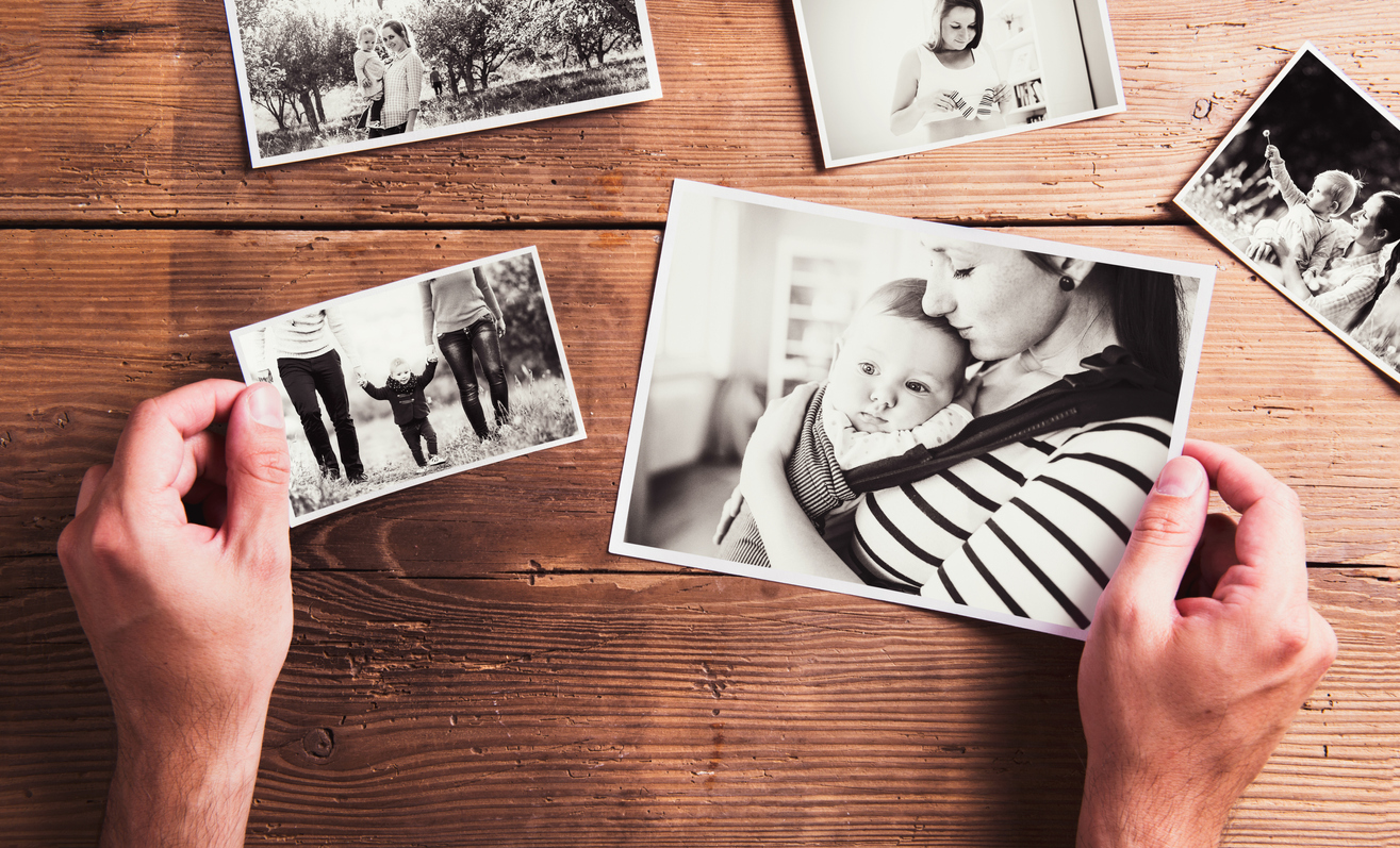 Mothers day composition. Black-and-white pictures, wooden backgr