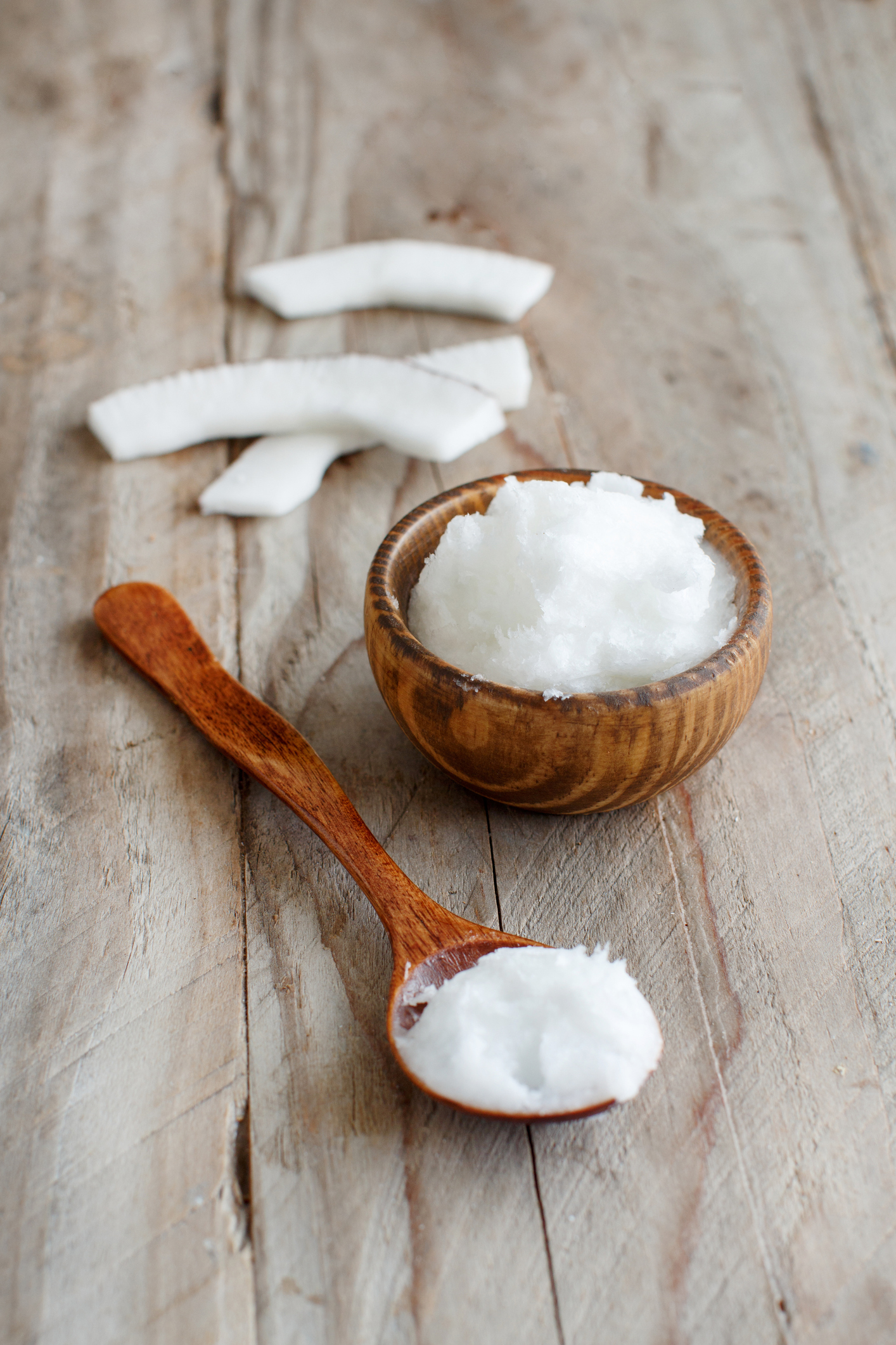 Coconut oil in a bowl with a spoon