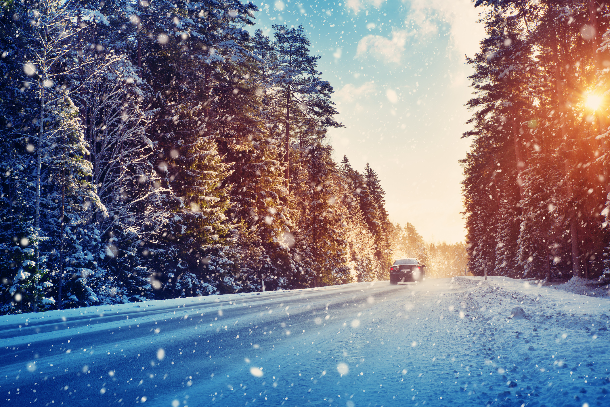 Car tires on winter road