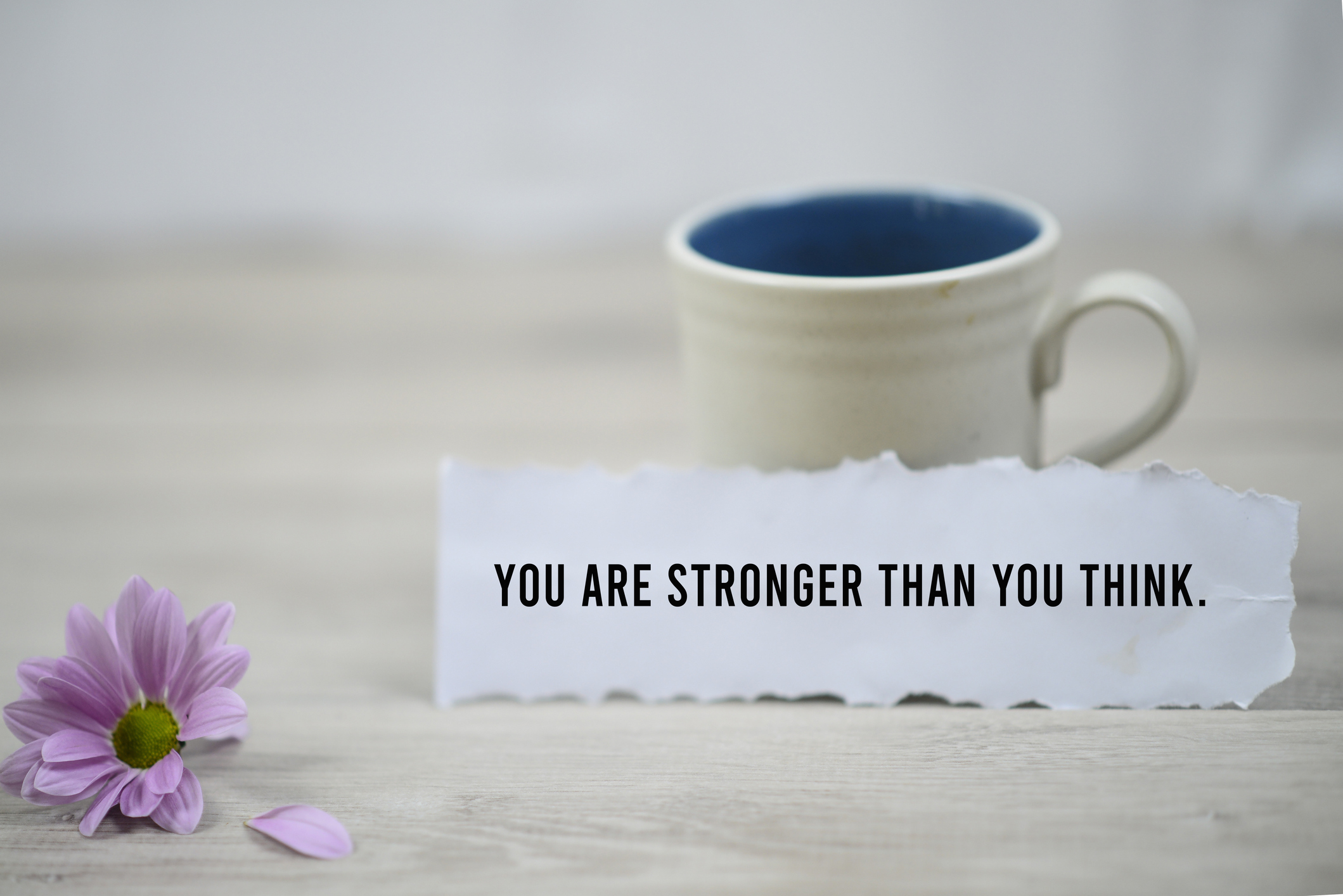 You are stronger than you think, a paper note with morning coffee.