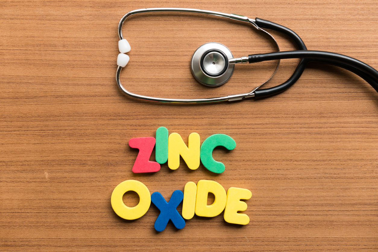 colorful word with stethoscope on wooden background