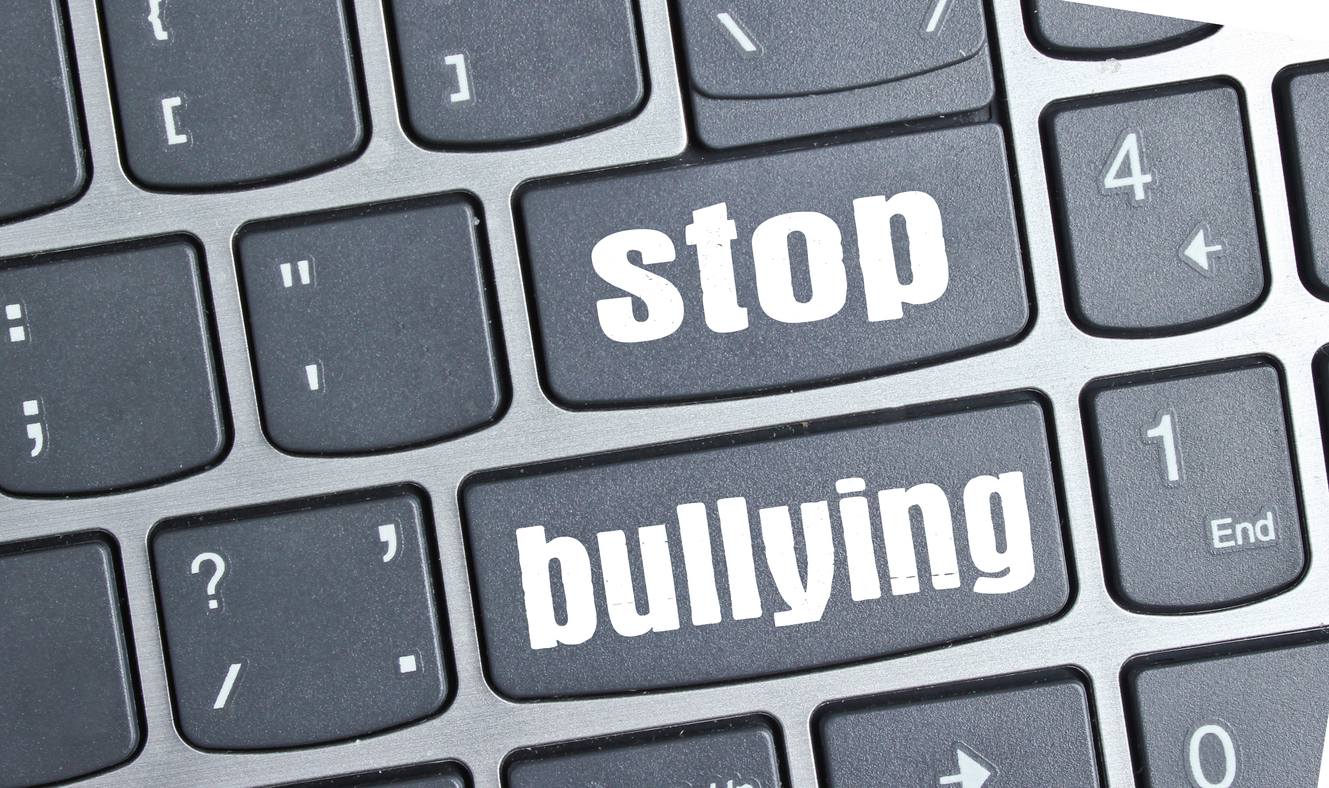 Inscription stop bullying on the keyboard keys