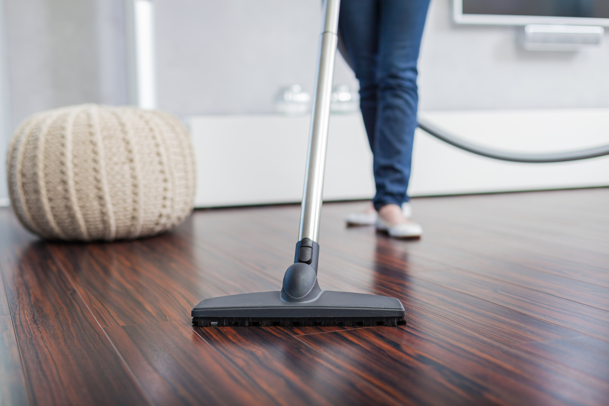 Attractive Female with Vacuum Cleaner