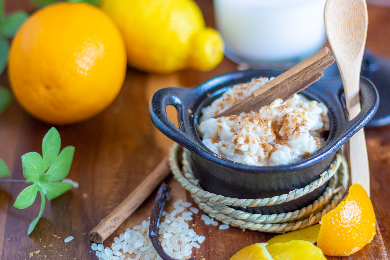 Homemade rice pudding dessert with lemon, orange and cinnamon flavor