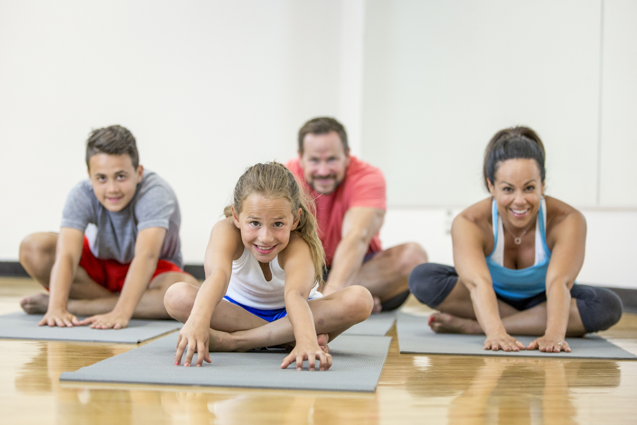 Stretching on an Exercise Mat