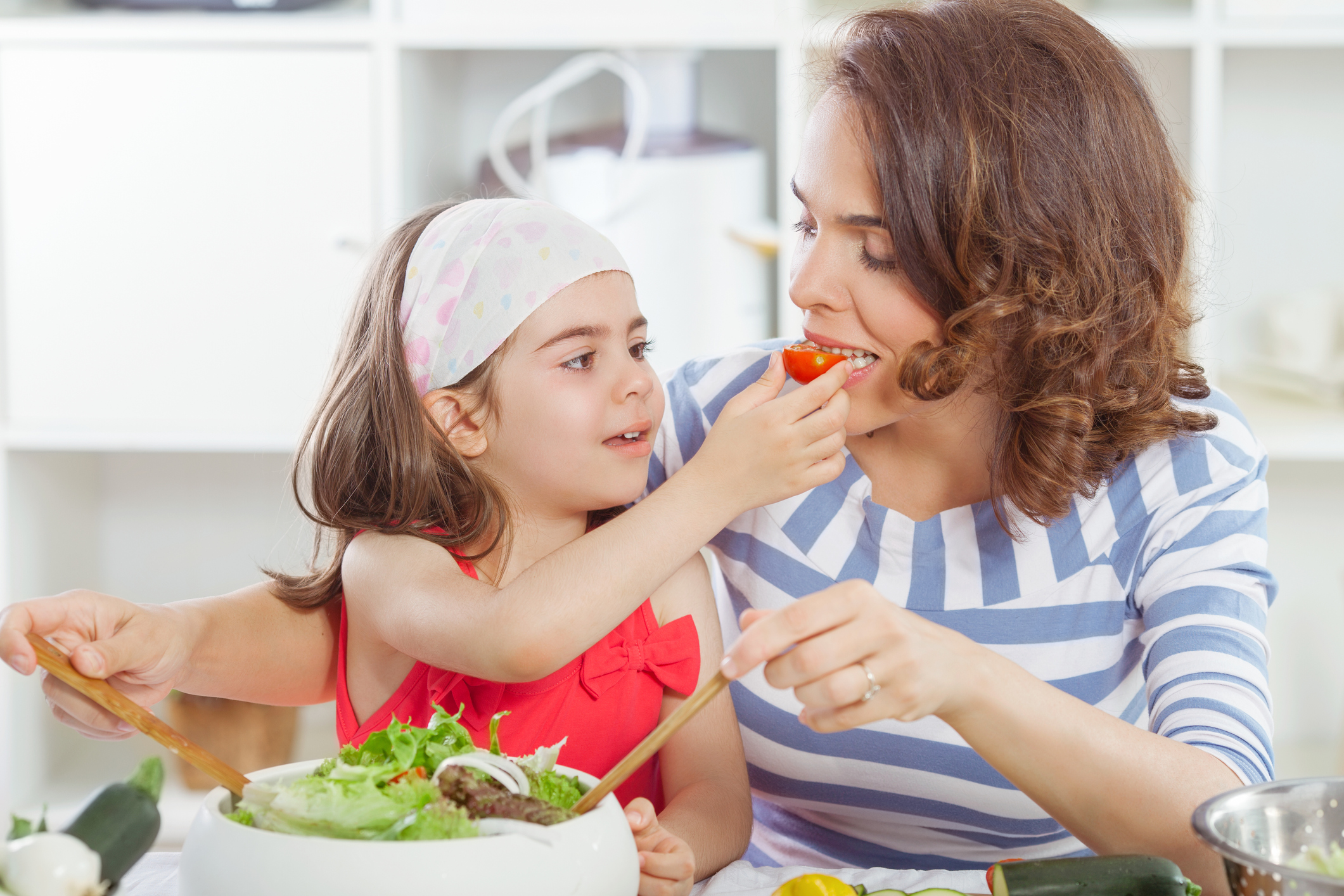 Mother and Daughter Preparing Food