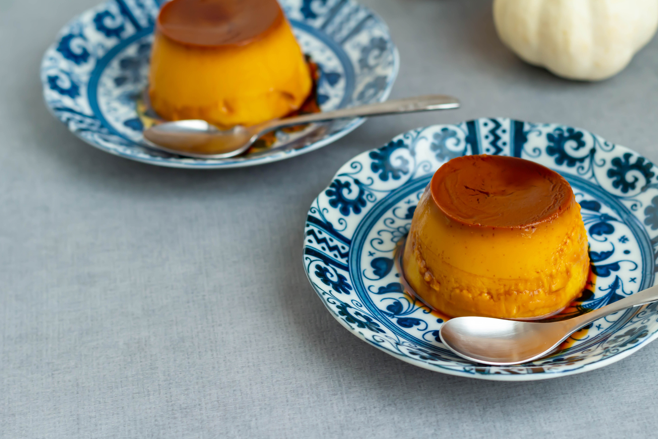 Pumpkin pudding and white pumpkin on a plate