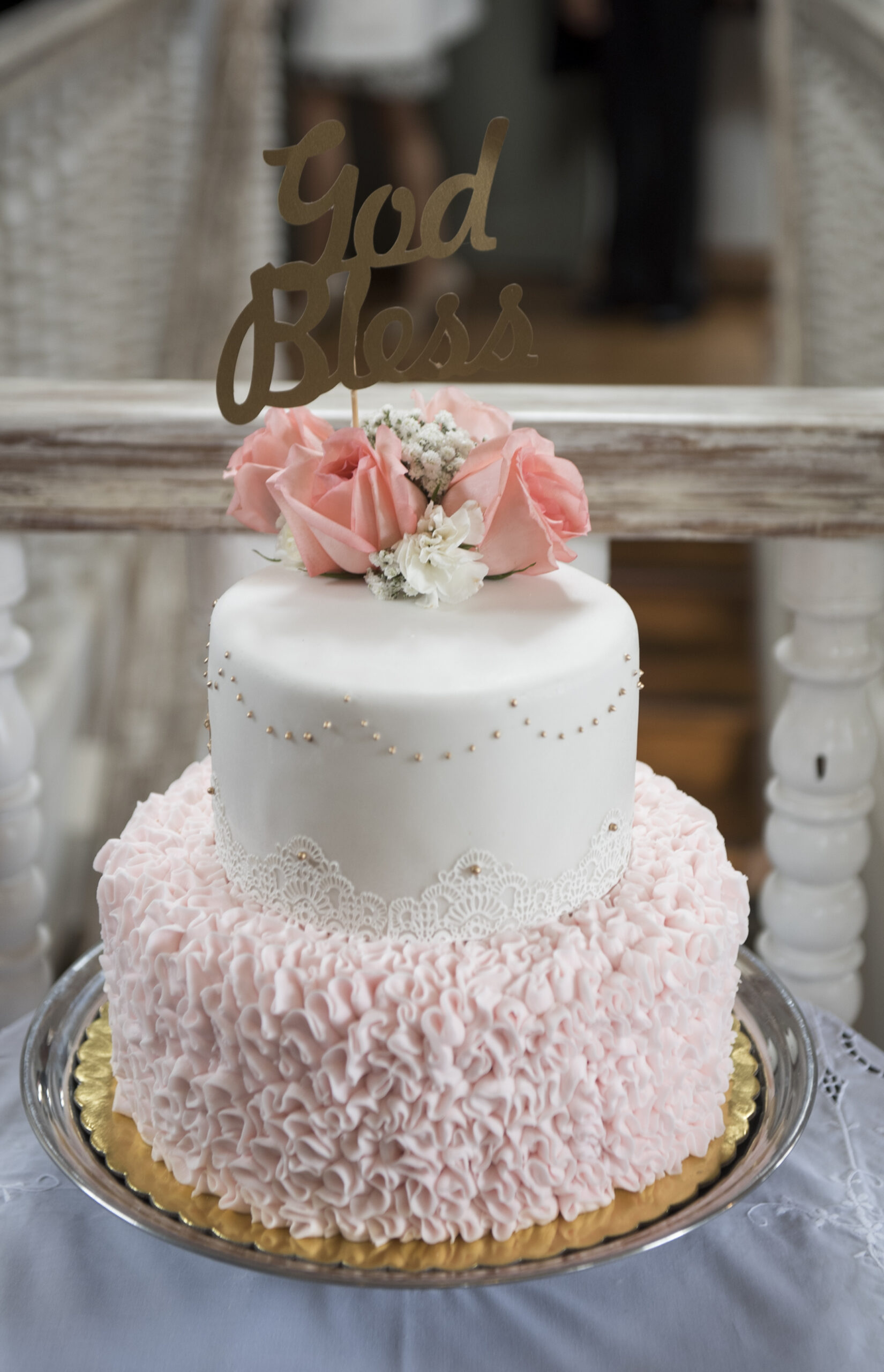 Cake for christening girl. Decorated with roses.