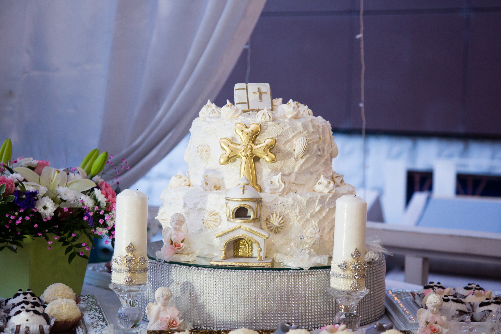 Round multi tiered christening cake