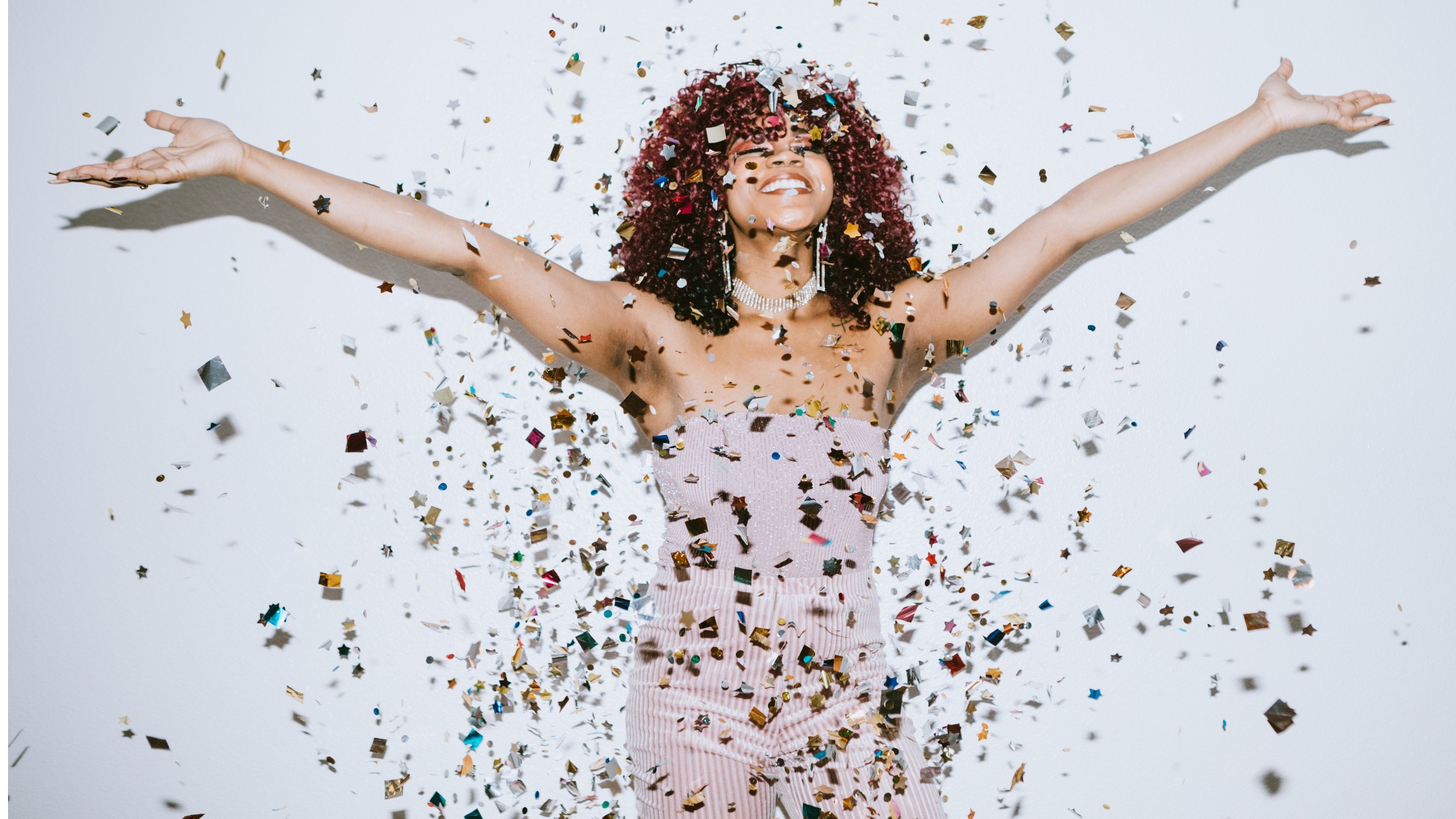 generation-z-young-woman-celebrates-with-confetti-picture-id1087301420-2.jpg